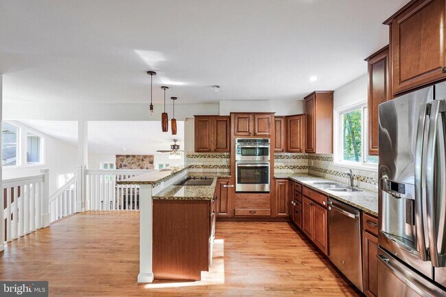 Building Photo - 8115 King Arthurs Ct