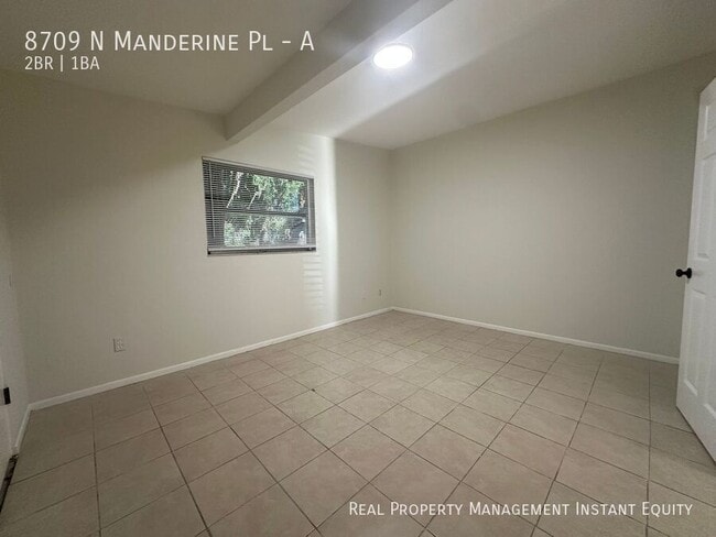 Building Photo - 8709 N Mandarine Pl