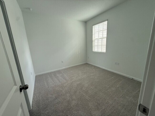 Building Photo - Brand new construction 3 Bedroom Town Home in Island Village of Celebration