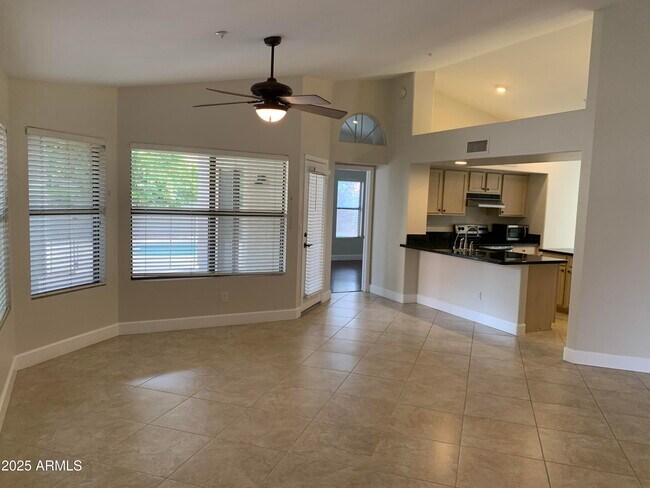 Building Photo - 8889 E Aster Dr