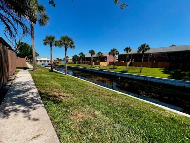 Building Photo - 2X2.5 -MOVE IN NOW! NEW LVP FLOORING ON 1ST FLOOR! NEW CARPET ON 2ND FLOOR! WATER VIEWS! CALL TOD...