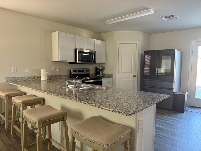 Building Photo - 4 BR 2 Story FURNISHED Home near Colorado River "River's Edge" Neighborhood