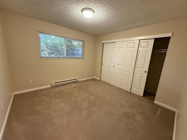 Building Photo - 18675 NW Shadow Lane ~ REFRESHED Rock Creek Duplex with 6 Month lease