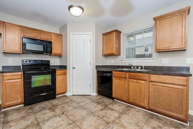 Building Photo - 8055 Logan Dr