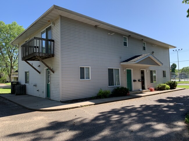 2-level townhome built for student living. Off-street paved parking. - 1716 5th St E