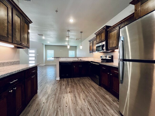 Building Photo - 4 Private Suites • Walk to Texas Tech • Modern Finishes