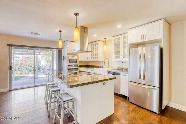 Building Photo - 8640 E Wilshire Dr