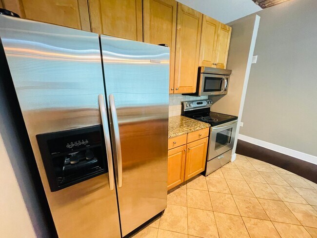 Building Photo - Modern High-Rise Condo in Downtown Orlando...