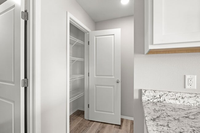 Building Photo - 4 bedroom home with a fenced in yard!