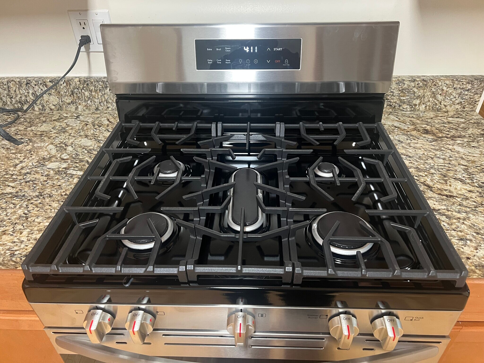 Five burner stove - 3748 W Lyndale St