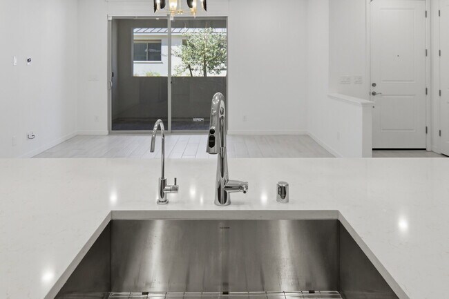 Building Photo - Experience refined living in this beautifully appointed 3-bedroom, 2.5-bathroom townhome spanning...