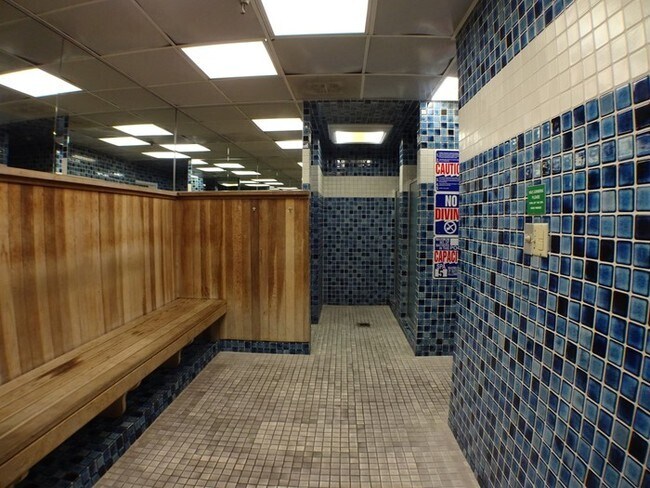 Men and women’s private jacuzzi, sauna and showers off gym - 436 N Bellflower Blvd