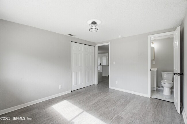 Building Photo - 7386 Dostie Dr E