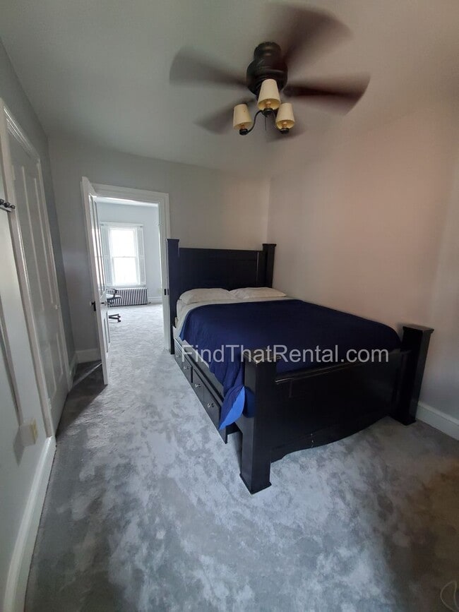 Building Photo - Charming Historic Retreat with Private Fenced Yard & Parking – Prime Downtown Location