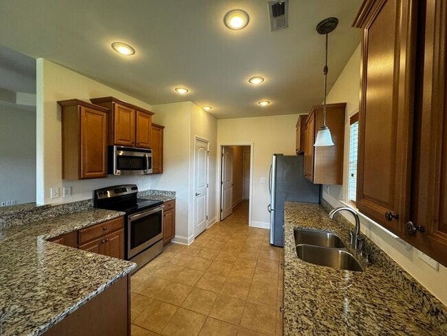 Building Photo - Available now in amazing location