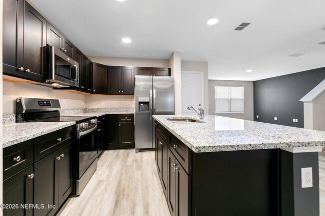 Building Photo - 8822 Eaton Ave