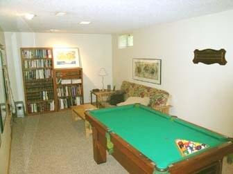 Finished basement (now includes an egress window in place of the small window, not shown). There is also a furnace room that has a lot of storage space. - 2261 Scudder Street