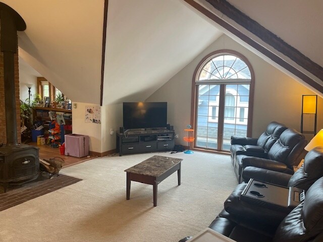 3rd floor bedroom or living room with wood burning stove - 120 Edgerton St