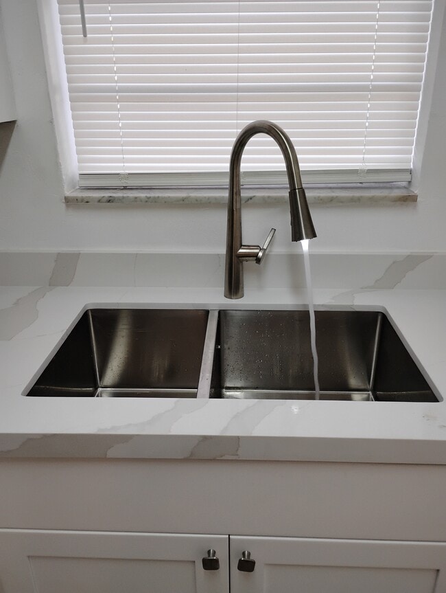 Brand new kitchen sink and faucet - 3761 SW 59th Terrace