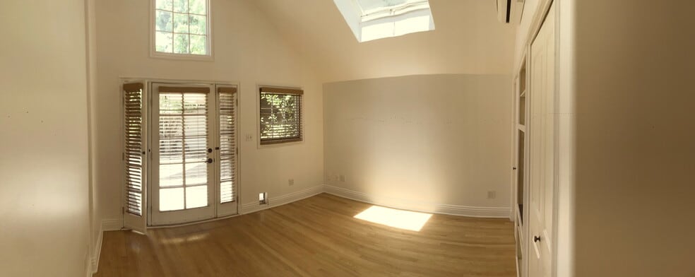 Bedroom 4/Family Room with Cathedral Ceiling, Skylight, Door to Courtyard - 325 S Berkeley Ave