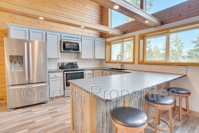 Building Photo - 11590 W Riverview Dr