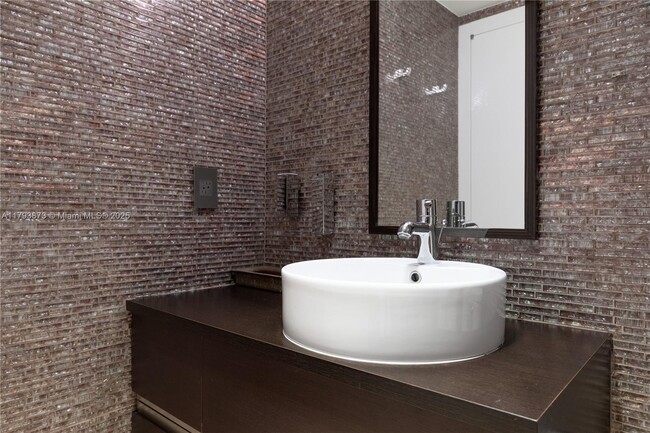Building Photo - 5875 Collins Ave