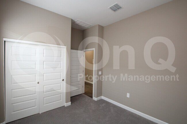 Building Photo - 40774 W Sunland Dr
