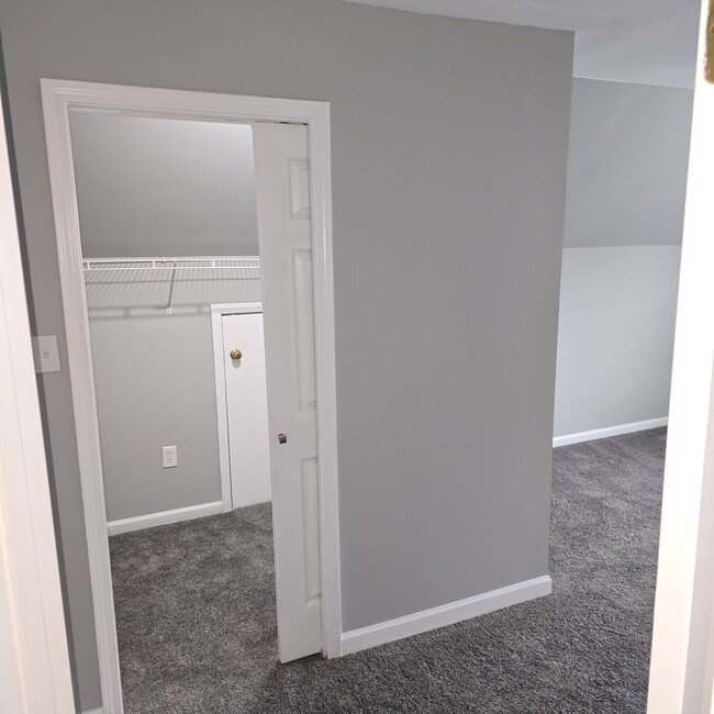 3th bedroom closet with additional storage inside - 4007 Longbow Ct