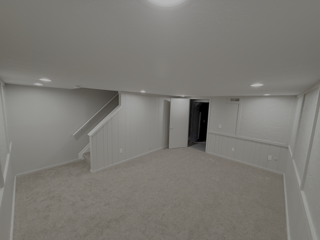 Cozy half finished basement with carpeting, recessed lighting, and plenty of space for a family room - 7778 Willowcove Ct