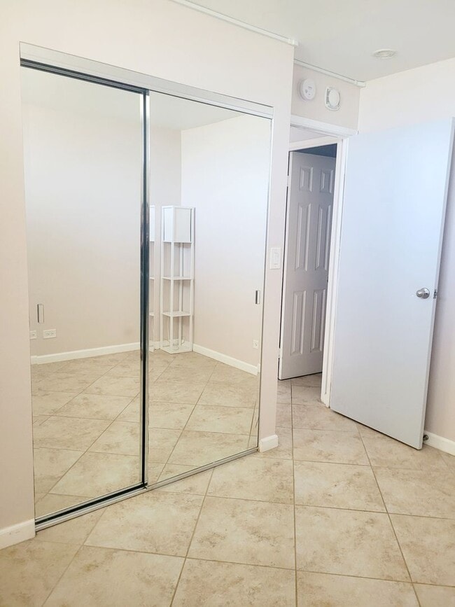 Building Photo - AVAILABLE | 2 Bedroom, 1 Bathroom Condo with 1 Assigned Parking Stall