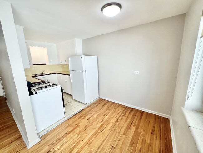 Welcome to your charming kitchen nook, a perfect blend of style and practicality. - The Birney Apartments