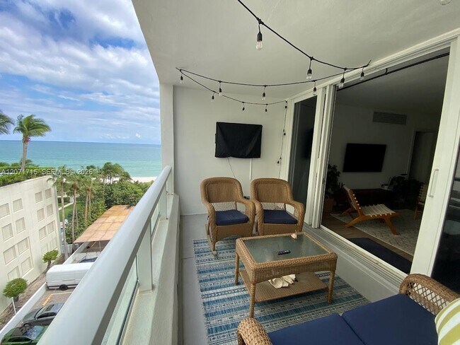 Building Photo - 5005 Collins Ave