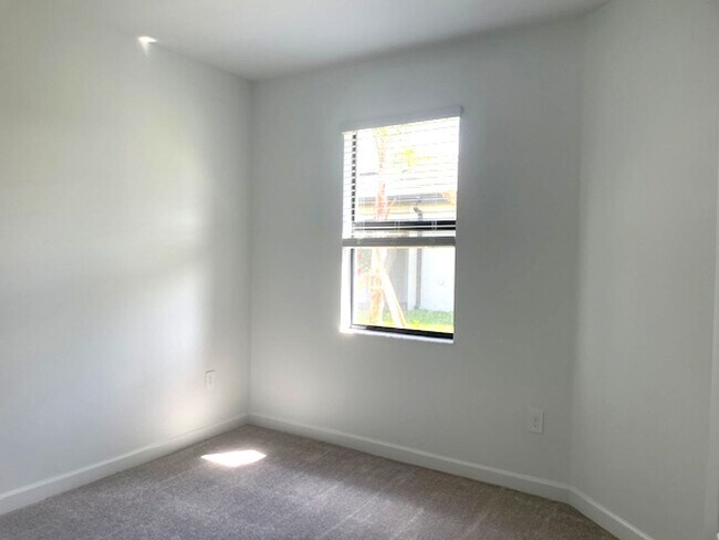 Building Photo - New Construction 2 Bedroom PLUS a Home Office Available in Lorraine Lakes