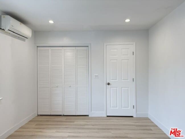 Building Photo - 1219 N Azusa Ave