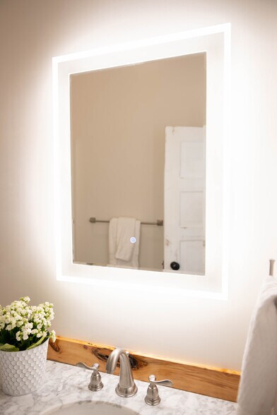 Electronic Mirrow with built in lighting - 105 N Main St