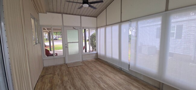 Building Photo - 2 bed 2 baths with carport