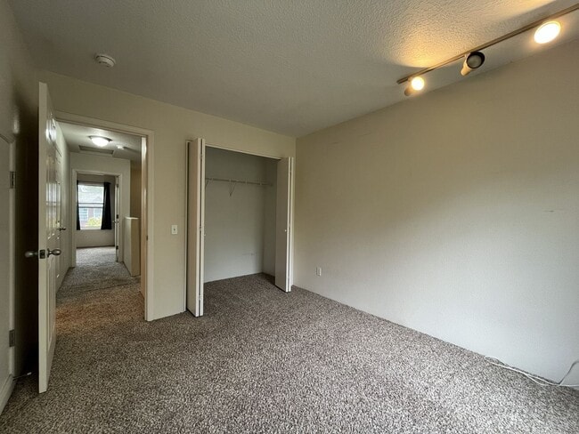 Building Photo - Spacious Three-Story Townhome Near Orenco Station with Attached Garage, Private Balcony, and Vaul...