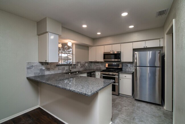 Building Photo - Nicely Updated Four Bedroom Home!