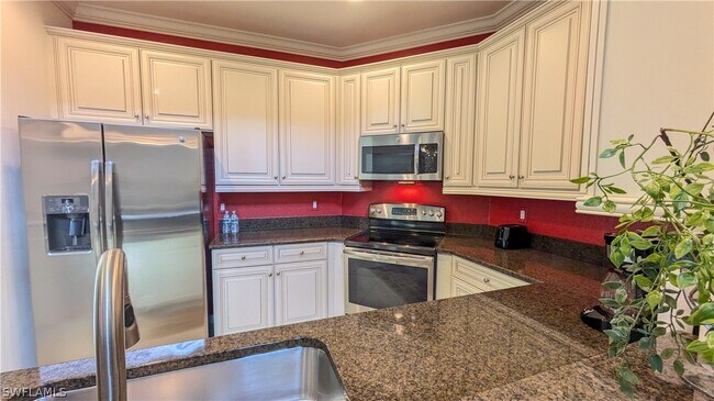 Building Photo - 9055 Capistrano St N