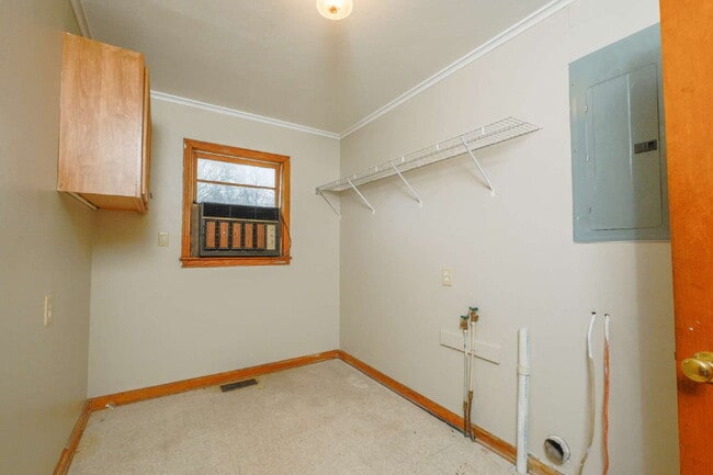 Building Photo - "Charming 3-Bedroom Greenfield Home with Gleaming Hardwood Floors – 1256 Sq Ft of Cozy Comfort!"