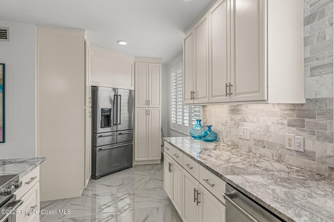 Building Photo - 7415 Aquarina Beach Dr