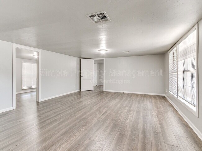 Building Photo - 9706 N Garnett Dr