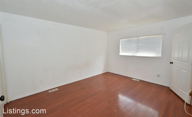 Building Photo - 3 br, 1 bath House - 8195 Freemantle Dr