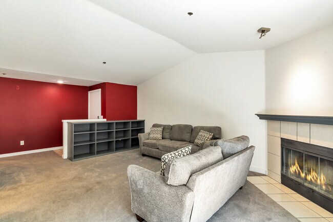Living room with the fireplace. - 19404 Bothell Way NE