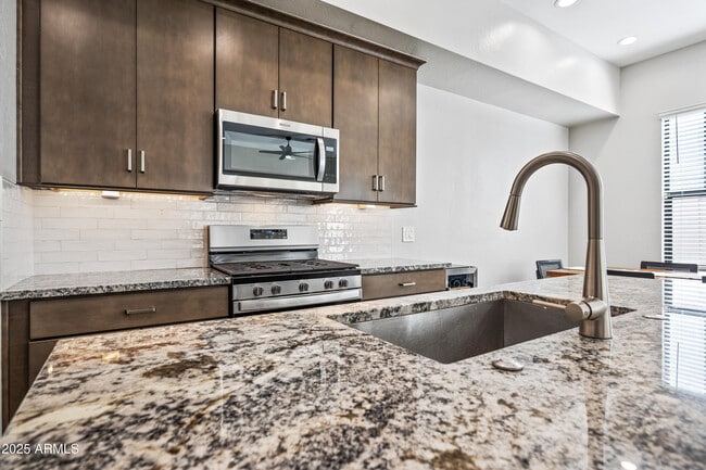 Building Photo - 4827 E Village Dr