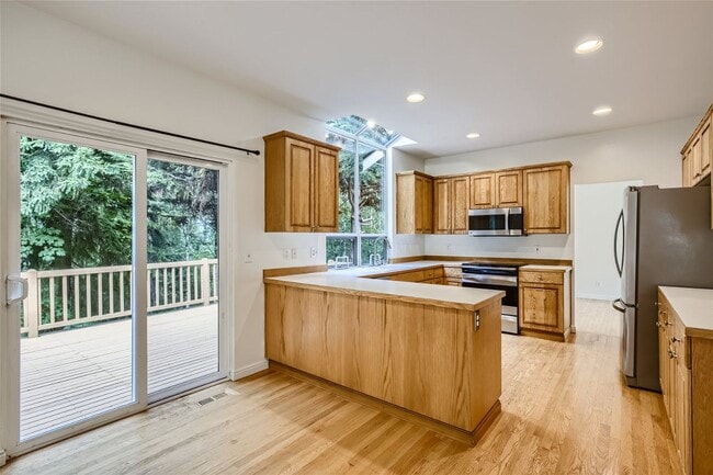 Building Photo - Spacious 4-Bedroom Home in Kenmore | Private Greenbelt Setting + Landscaping Included