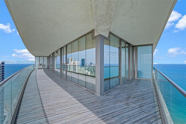 Building Photo - 18975 Collins Ave