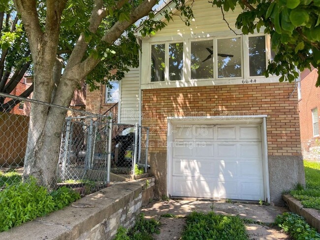 Building Photo - 6644 Sutherland Ave