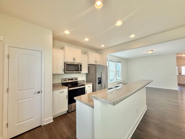 Building Photo - Spacious 3BD, 2.5BA End Unit Raleigh Townhome Near White Oak Shopping Center, I-40, and Downtown ...