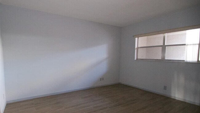 Building Photo - 7355 Woodmont Terrace